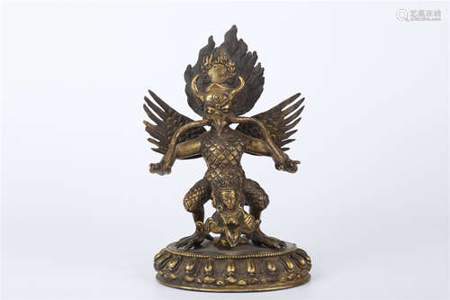 A Gilt Copper Suparna Buddha Statue