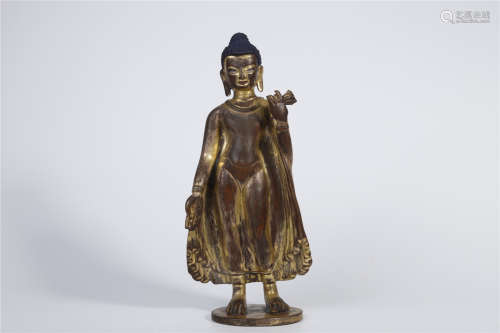 A Gilt Copper Standing Sakyamuni Buddha Statue