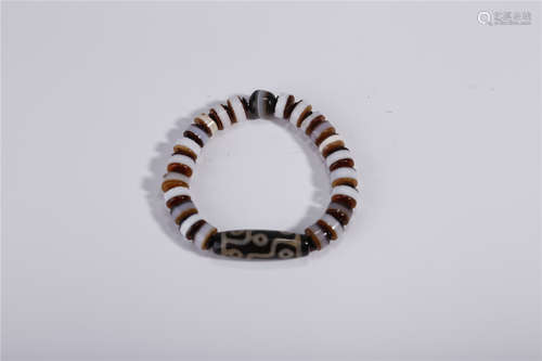 A Bracelet of Agate Dzi Beads.