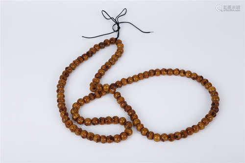 A String of Antique Bone Buddha Beads