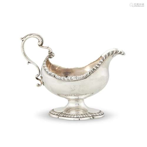 AN EARLY GEORGE III SILVER OVAL PEDESTAL SAUCE BOAT BY SEBAS...