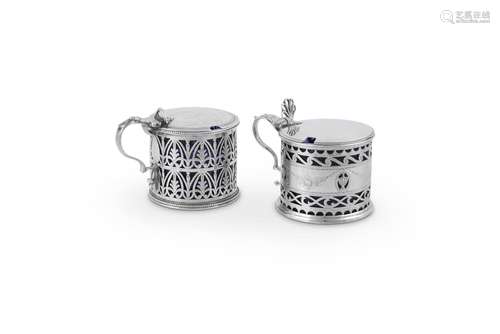 TWO GEORGE III SILVER PIERCED DRUM MUSTARD POTS BY ROBERT HE...