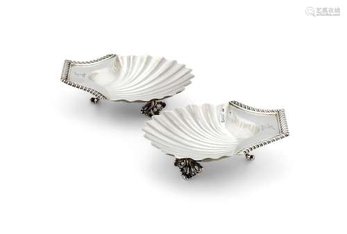 A PAIR OF WILLIAM IV SILVER SHELL BUTTER DISHES BY EDWARD FA...