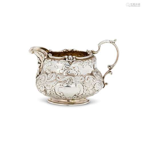 A VICTORIAN SILVER BALUSTER CREAM JUG BY WALTER MORRISSE