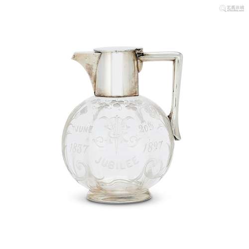 A LATE VICTORIAN SILVER MOUNTED GLASS CLARET JUG BY JOHN GRI...