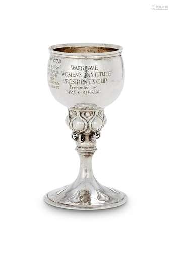 AN ARTS AND CRAFTS HAMMERED SILVER PRESENTATION GOBLET BY OM...