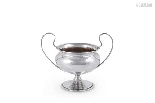 AN ARTS AND CRAFTS HAMMERED SILVER TWIN HANDLED CUP BY OMAR ...