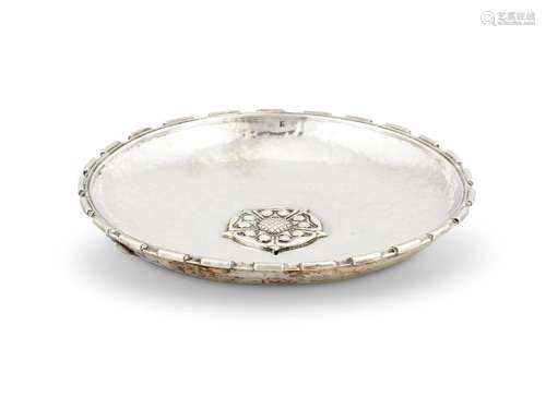 AN ARTS AND CRAFTS HAMMERED SILVER CIRCULAR PIN DISH BY OMAR...