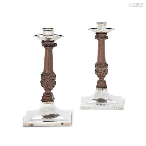 A PAIR OF ARTS AND CRAFTS HAMMERED SILVER AND WOOD SQUARE CA...