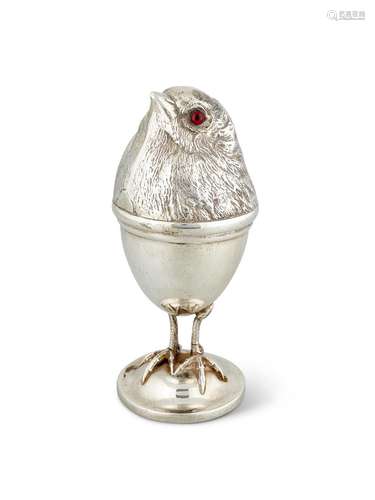 AN EDWARDIAN SILVER NOVELTY EGG CUP AND COVER BY SAMPSON MOR...