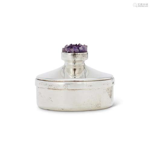 A PLAIN SILVER AND AMETHYST CIRCULAR BOX BY STUART DEVLIN