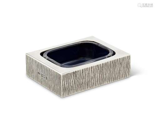 A SILVER RECTANGULAR DESK TIDY OR VIDE POCHE BY GERALD BENNE...