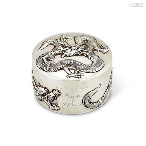 A CHINESE EXPORT SILVER CIRCULAR TABLE BOX BY WANG HING &...