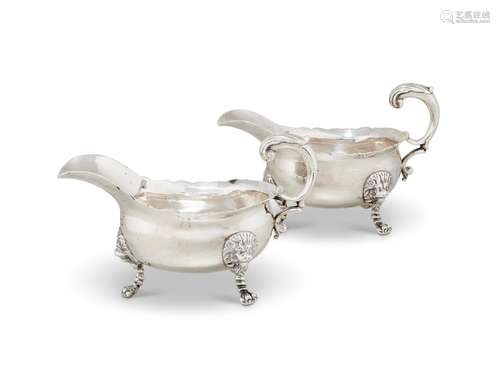 A PAIR OF EARLY GEORGE III SILVER OVAL SAUCE BOATS