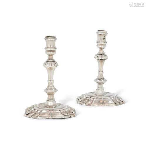 A PAIR OF GEORGE II SILVER TAPERSTICKS BY JAMES GOULD