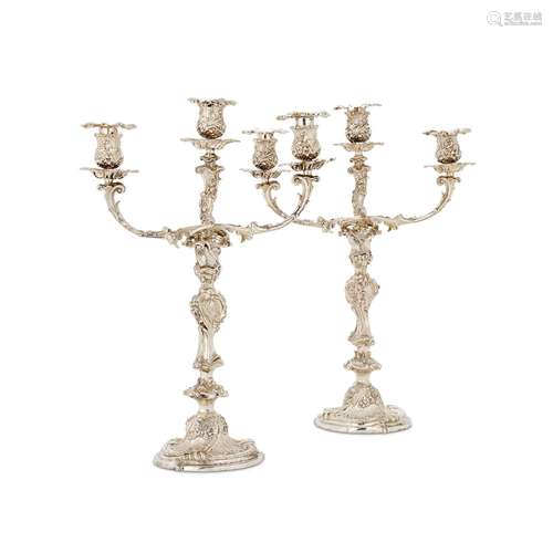 A PAIR OF VICTORIAN SILVER CANDLESTICKS BY ROBERT GARRARD II...