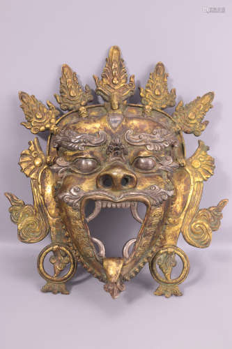 铜鎏金面具