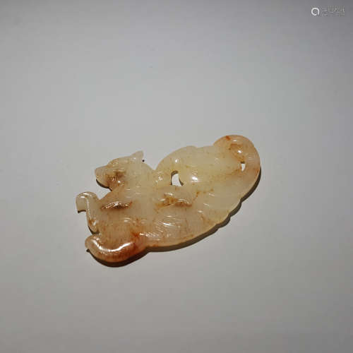 A Carved Russet Jade Ornament