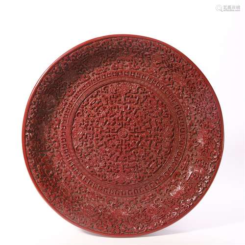 A Carved Cinnabar Lacquer Eight Treasures Plate