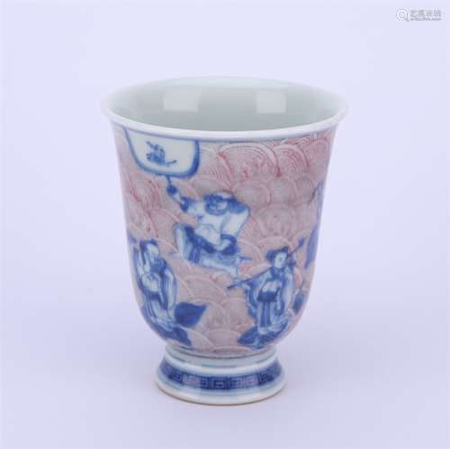 A Copper Red Glaze and Underglaze Blue Eight Immortals Cup