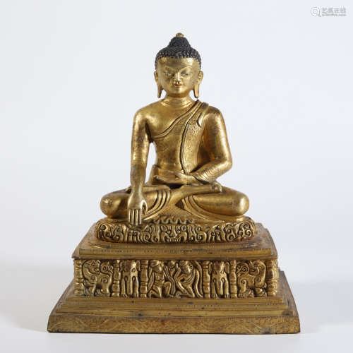 A Gilt Bronze Figure of Shakyamuni