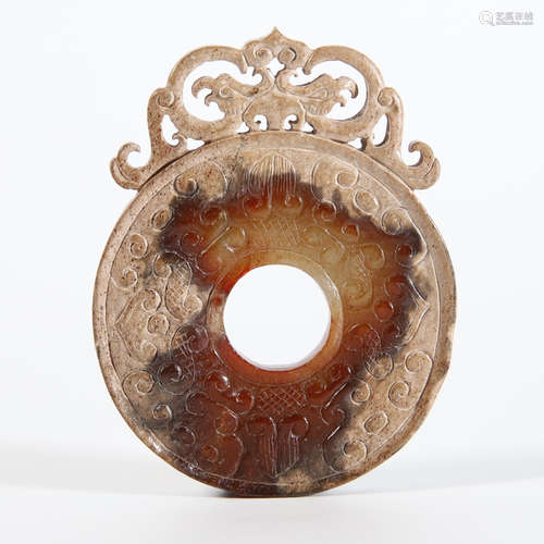 A Carved Brownish Jade Disc Bi