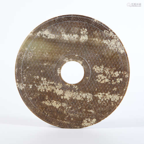 A Carved Brownish Jade Disc Bi