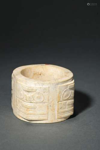 An Early Carved Jadestone Cong