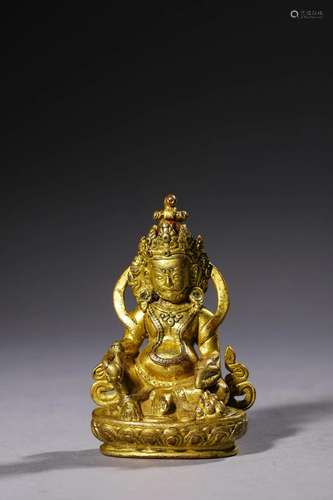 Ming Dynasty: A Gilt bronze God of Wealth statue