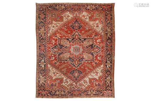 AN ANTIQUE HERIZ CARPET, NORTH-WEST PERSIA