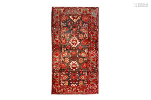 AN ANTIQUE BIJAR RUG, NORTH-WEST PERSIA