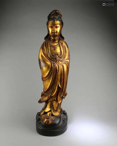 A Carved Gilt Wooden Guanyin Statue