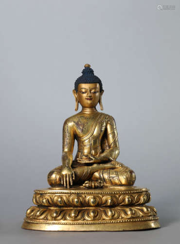 A Gilt Bronze Figure of Akshobya