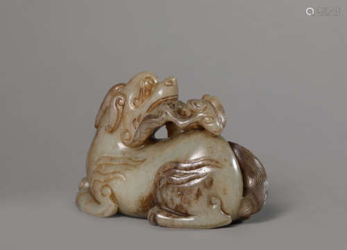 A Carved Buff Jade Pixie and Lingzhi Ornament