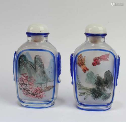 A Group of Two Peking Glass Snuff Bottles