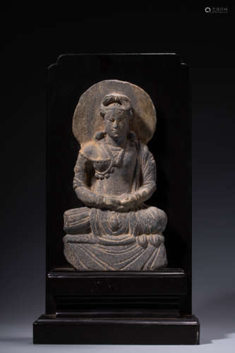 A Carved Stone Buddha Statue