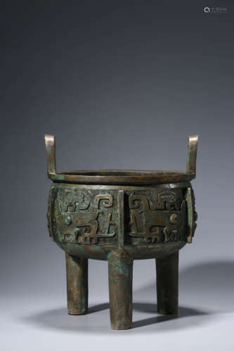 A Bronze Ritual Beast-Face Ding Vessel