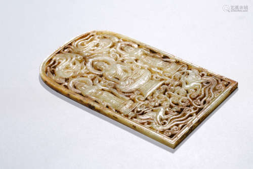 A Carved Russet Jade Buddhist Plaque