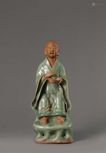 A Longquan Kiln Pottery Figure