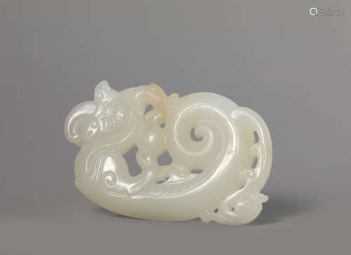 A Carved White Jade Chilong Pendant