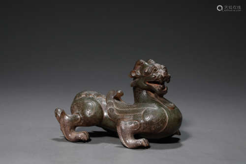 A Carved Brownish Jade Mythical Beast