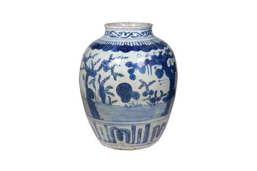 A blue and white porcelain vase, decorated with a bird and b...