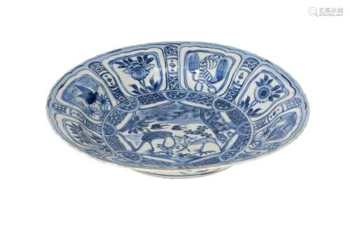 A blue and white porcelain deep dish, decorated with deer, b...