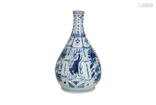 A blue and white porcelain vase, decorated with flowers. Unm...