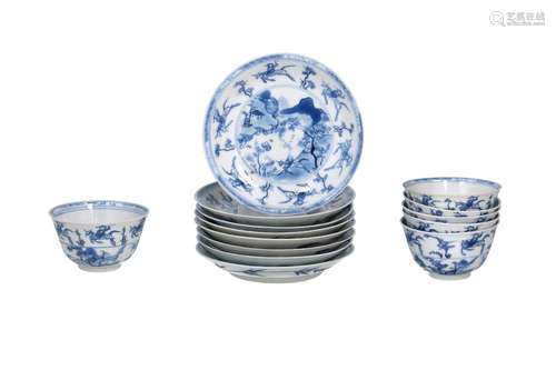 A set of six blue and white porcelain cups with eight saucer...