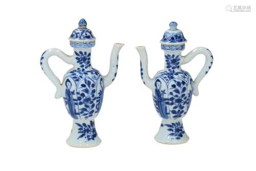 A pair of blue and white porcelain miniature coffee jugs wit...