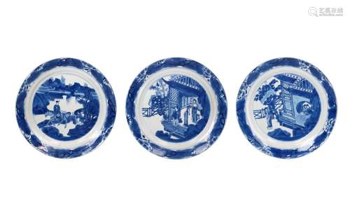 A set of three blue and white porcelain deep dishes, decorat...