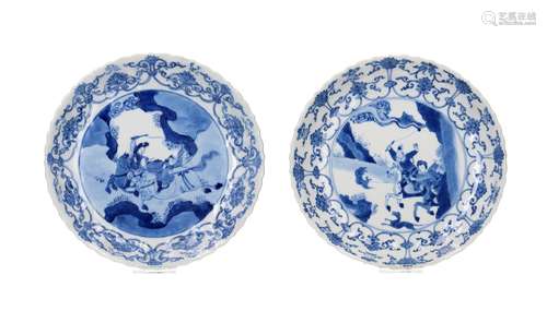 A near pair of blue and white porcelain dishes with scallope...