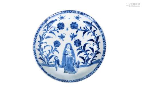 A blue and white porcelain saucer, decorated with Western sc...