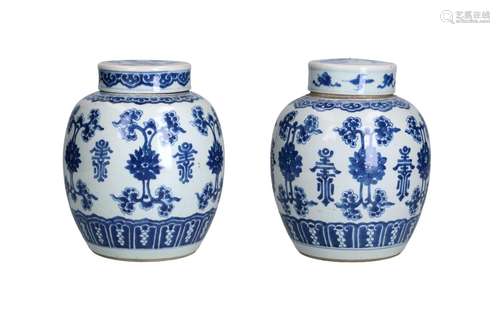 A pair of blue and white porcelain lidded jars, decorated wi...